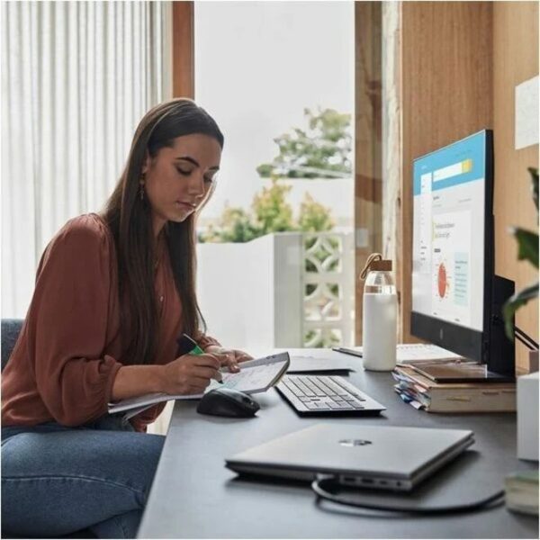 HP ProOne 440 G9 All-in-One PC (6B221EA) - Woman Working At Desk